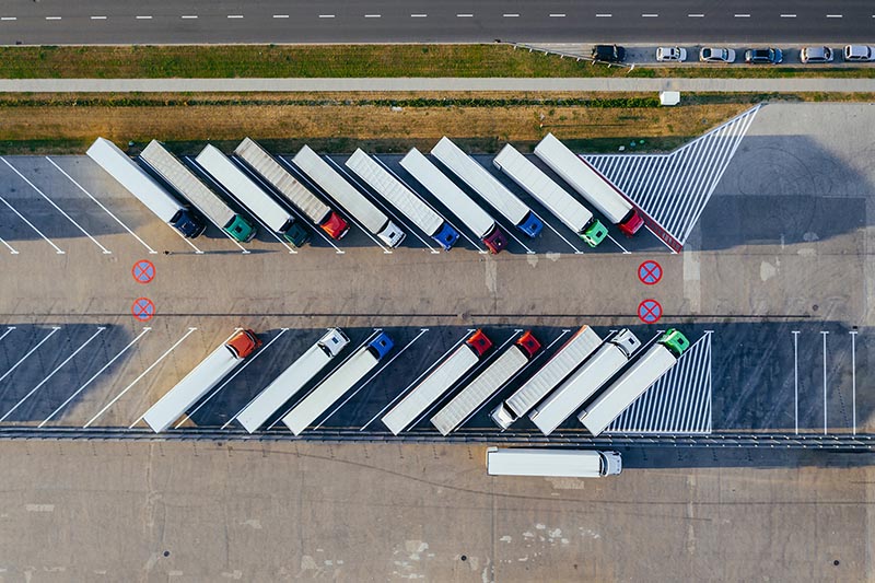 Parked trucks photographed from above